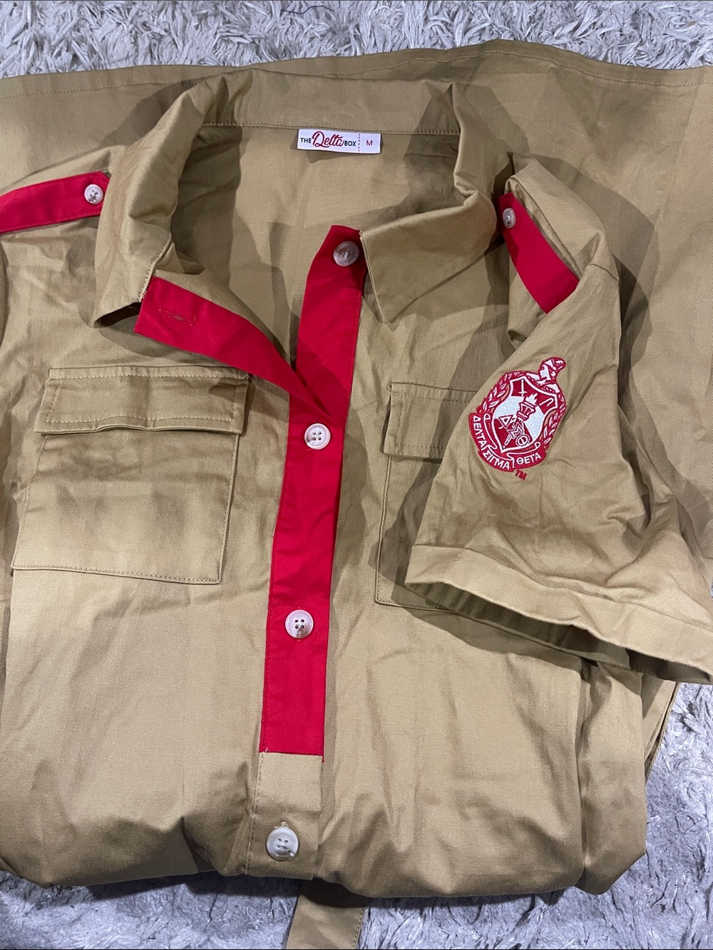 The Delta Box Button-Front Short Sleeve Mini Dress in Khaki with Red Trim